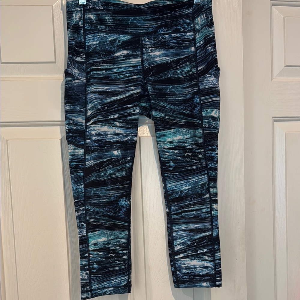 Lululemon Blue Patterned Leggings and matching tank top.